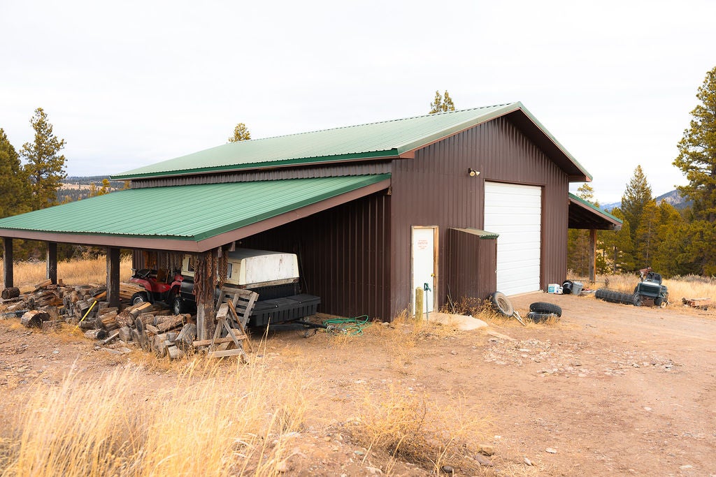 3358 Strandskov Road Lincoln, MT 59639 - Photo 39 of 80 View of outbuilding with a garage