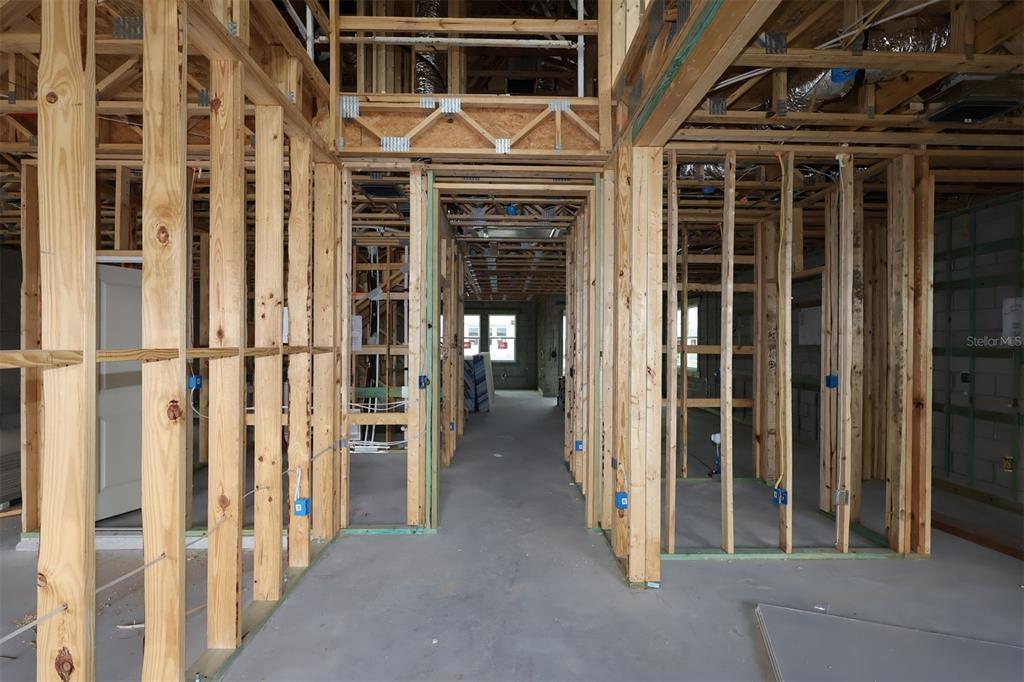 5308 High Line Drive St. Cloud, FL 34771 - Photo 11 of 18 a view of a house with a door and wooden walls