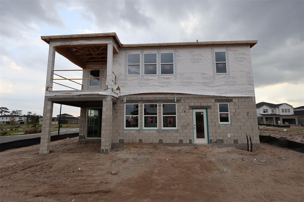 5308 High Line Drive St. Cloud, FL 34771 - Photo 14 of 18 a view of a house with a yard