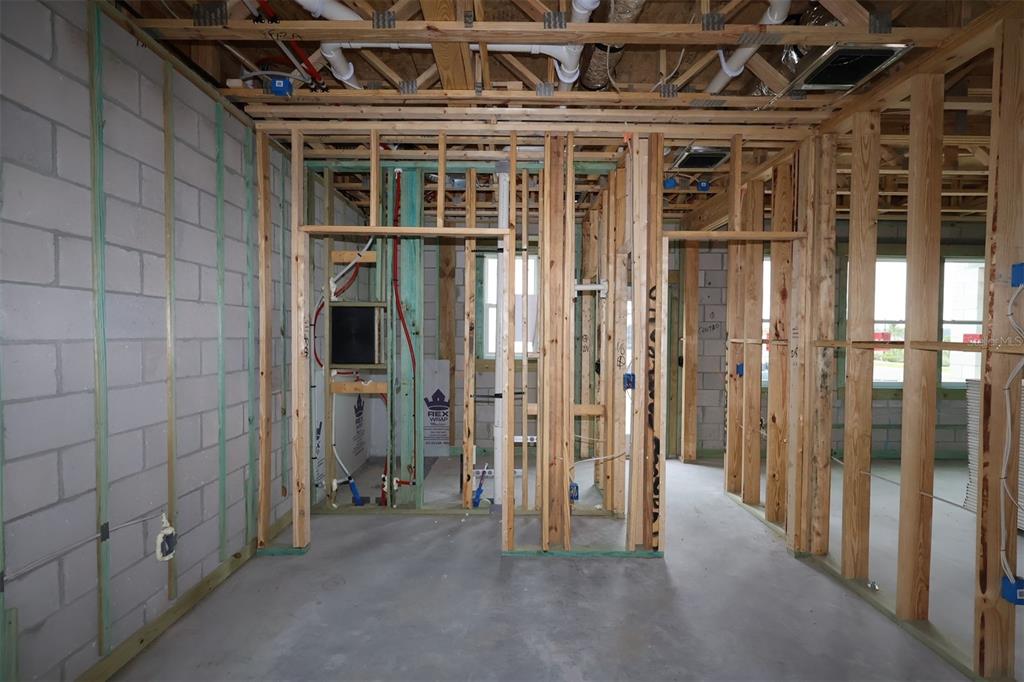 5308 High Line Drive St. Cloud, FL 34771 - Photo 2 of 18 a view of a hallway with wooden walls