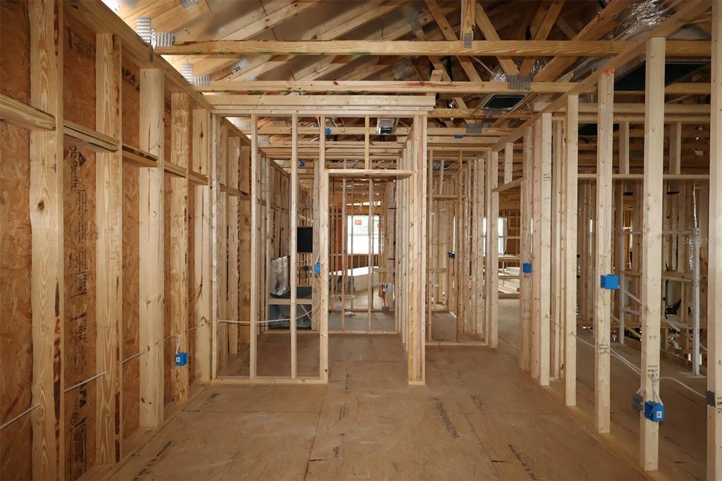 5308 High Line Drive St. Cloud, FL 34771 - Photo 7 of 18 a view of an empty room with wooden walls