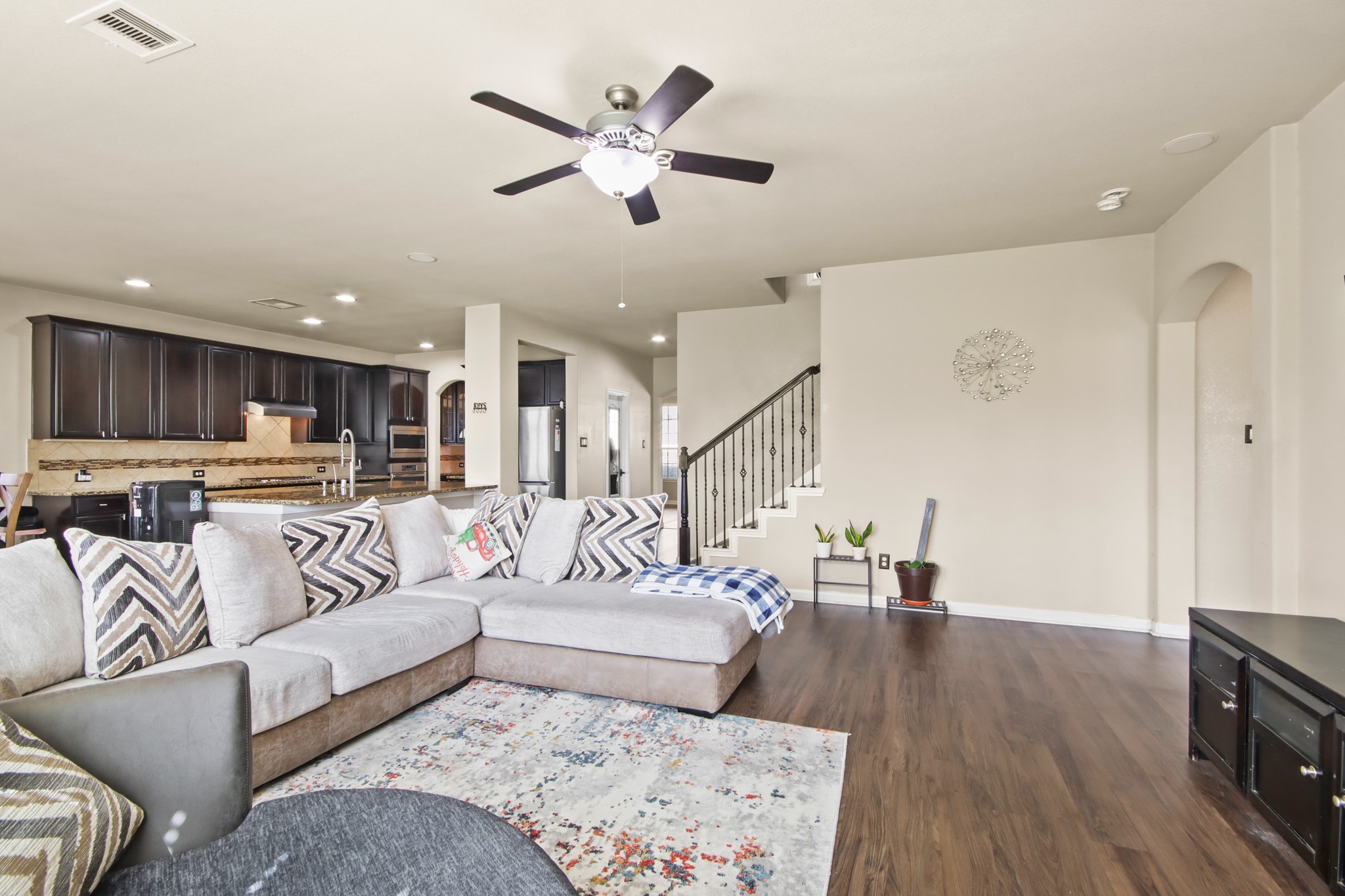 25407 Terrain Park Drive Spring, TX 77373 - Photo 11 of 33 a living room with furniture and kitchen view