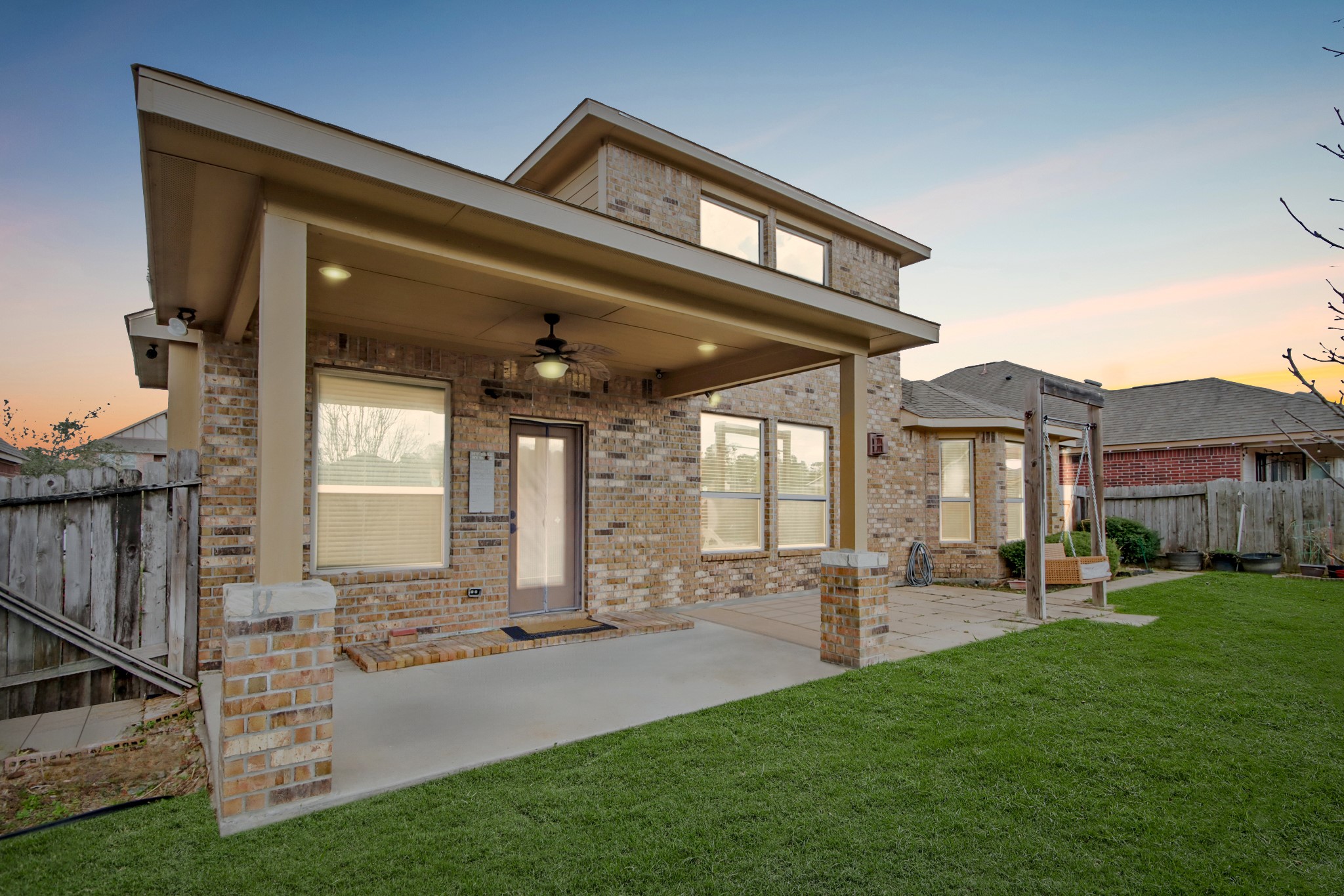 25407 Terrain Park Drive Spring, TX 77373 - Photo 32 of 33 a view of an house with backyard porch and sitting area