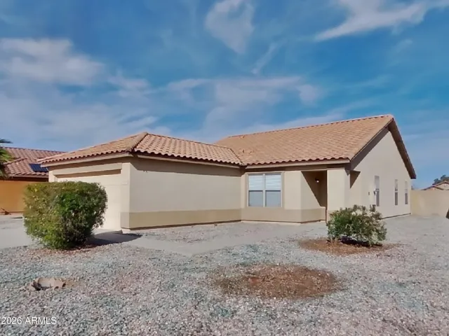 a view of a house with a street