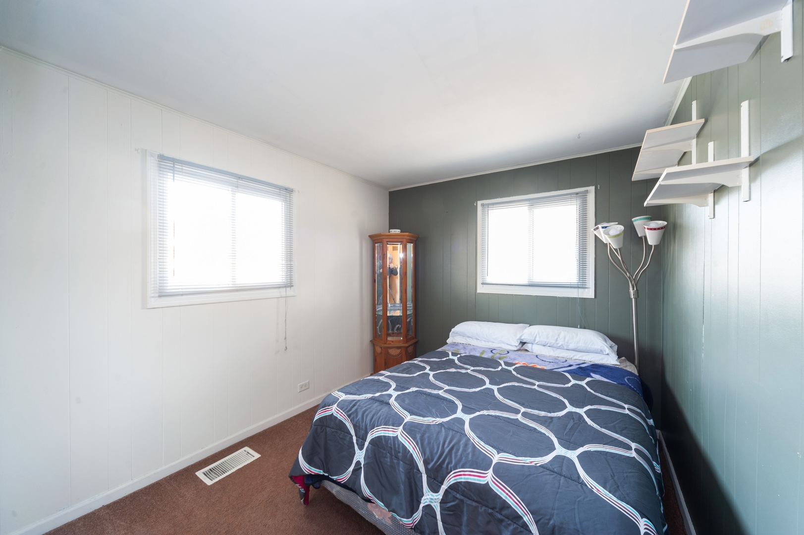 147 George Road Wheeling, IL 60090 - Photo 9 of 11 a bedroom with a large bed and a window