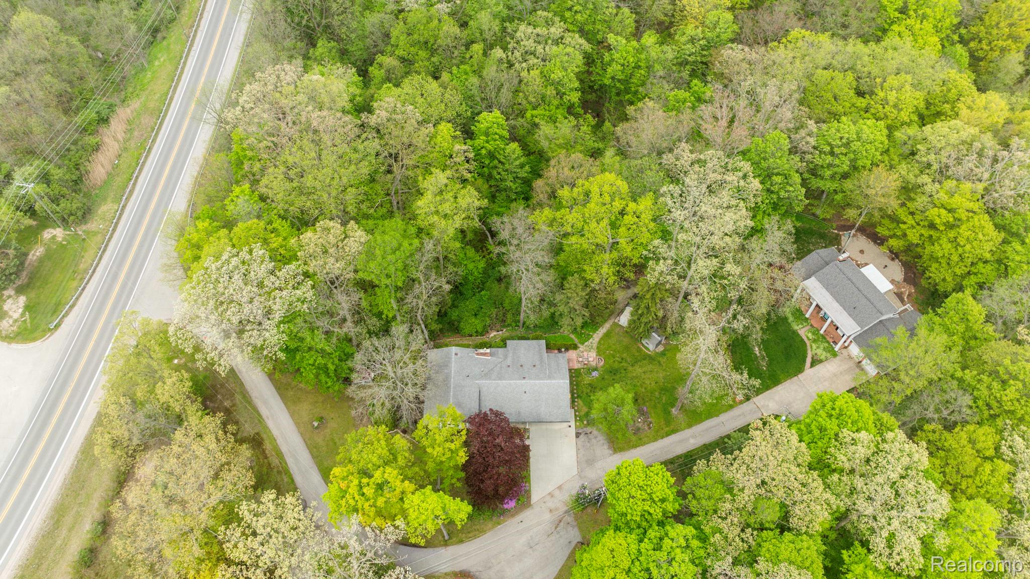 3560 North Road North Street, MI 48049 - Photo 42 of 53 Aerial view of a forest