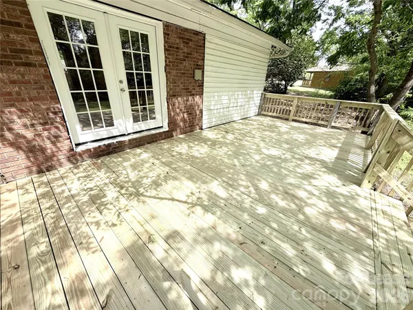 a view of backyard with deck