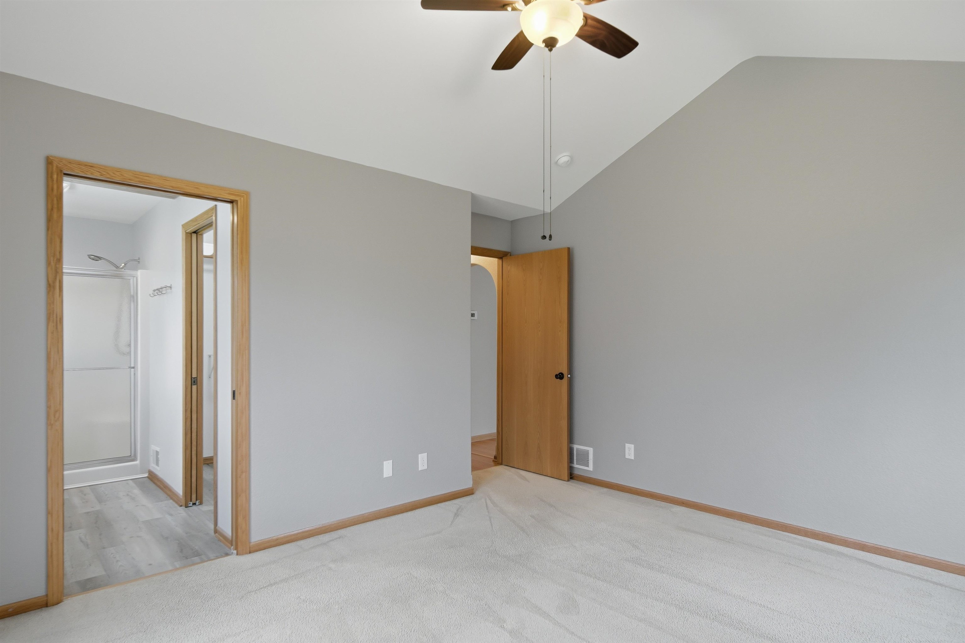 307 Portage Lane Dixon, IL 61021 - Photo 15 of 38 an empty room with a chandelier fan and closet area