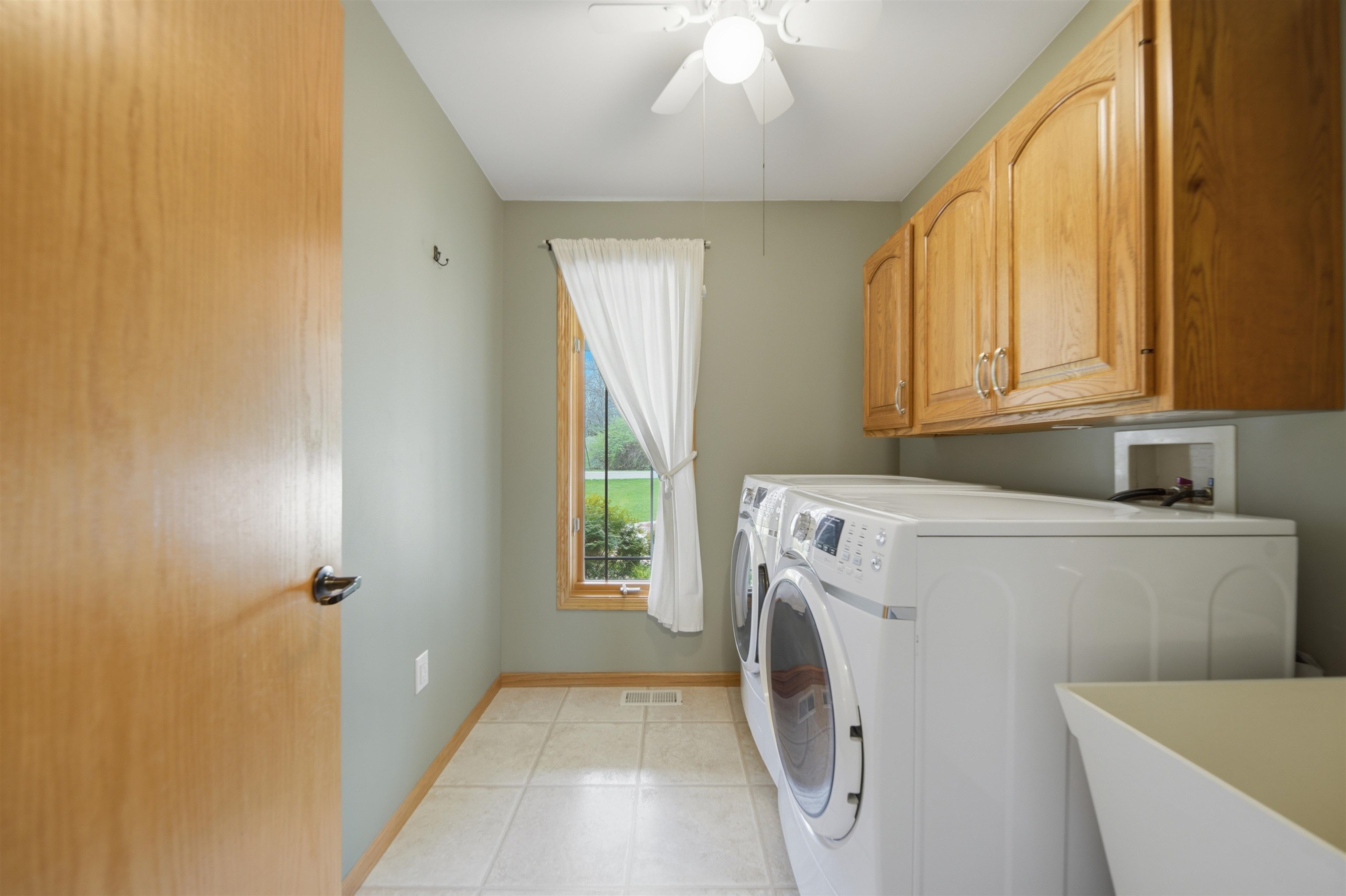 307 Portage Lane Dixon, IL 61021 - Photo 23 of 38 a utility room with dryer and washer