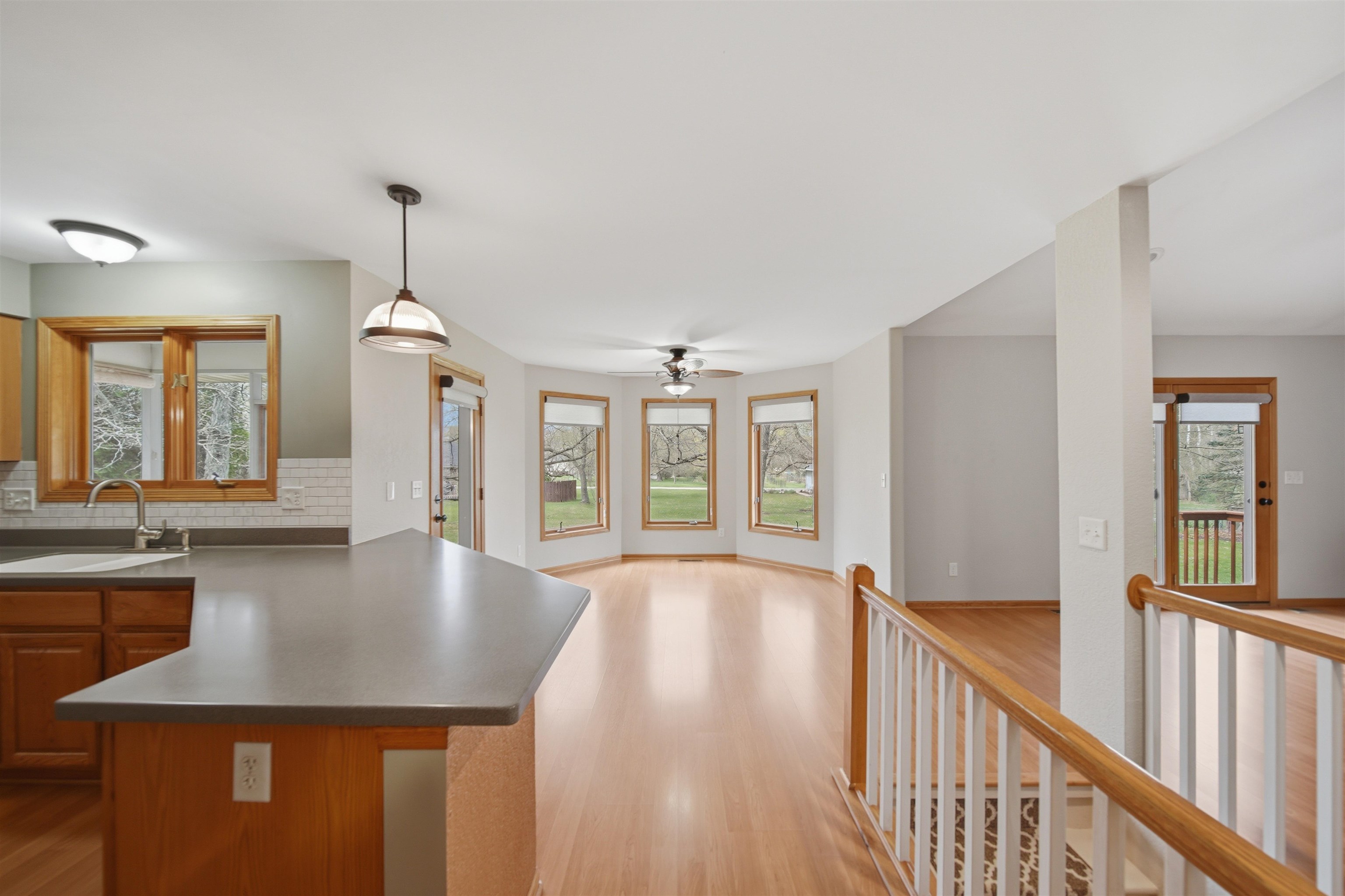 307 Portage Lane Dixon, IL 61021 - Photo 9 of 38 a view of a kitchen with furniture and floor to ceiling windows