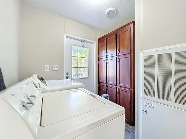 a bed room with a bed and a window