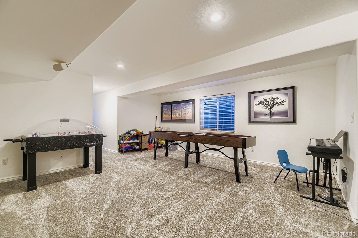 8356 Green Island Circle Lone Tree, CO 80124 - Photo 26 of 30 a view of a livingroom with furniture