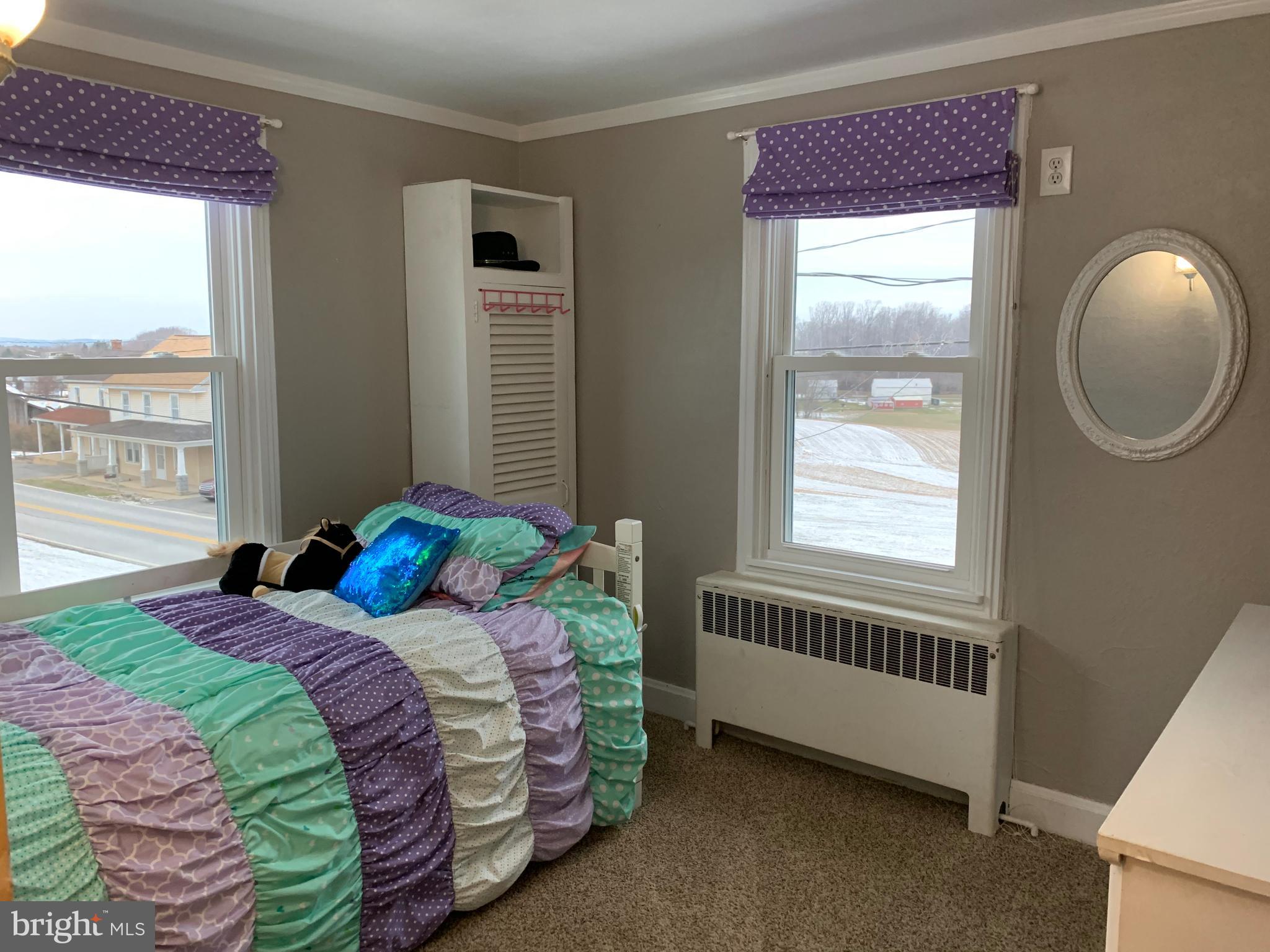 3317 River Road Conestoga, PA 17516 - Photo 13 of 33 a bedroom with a bed and a window