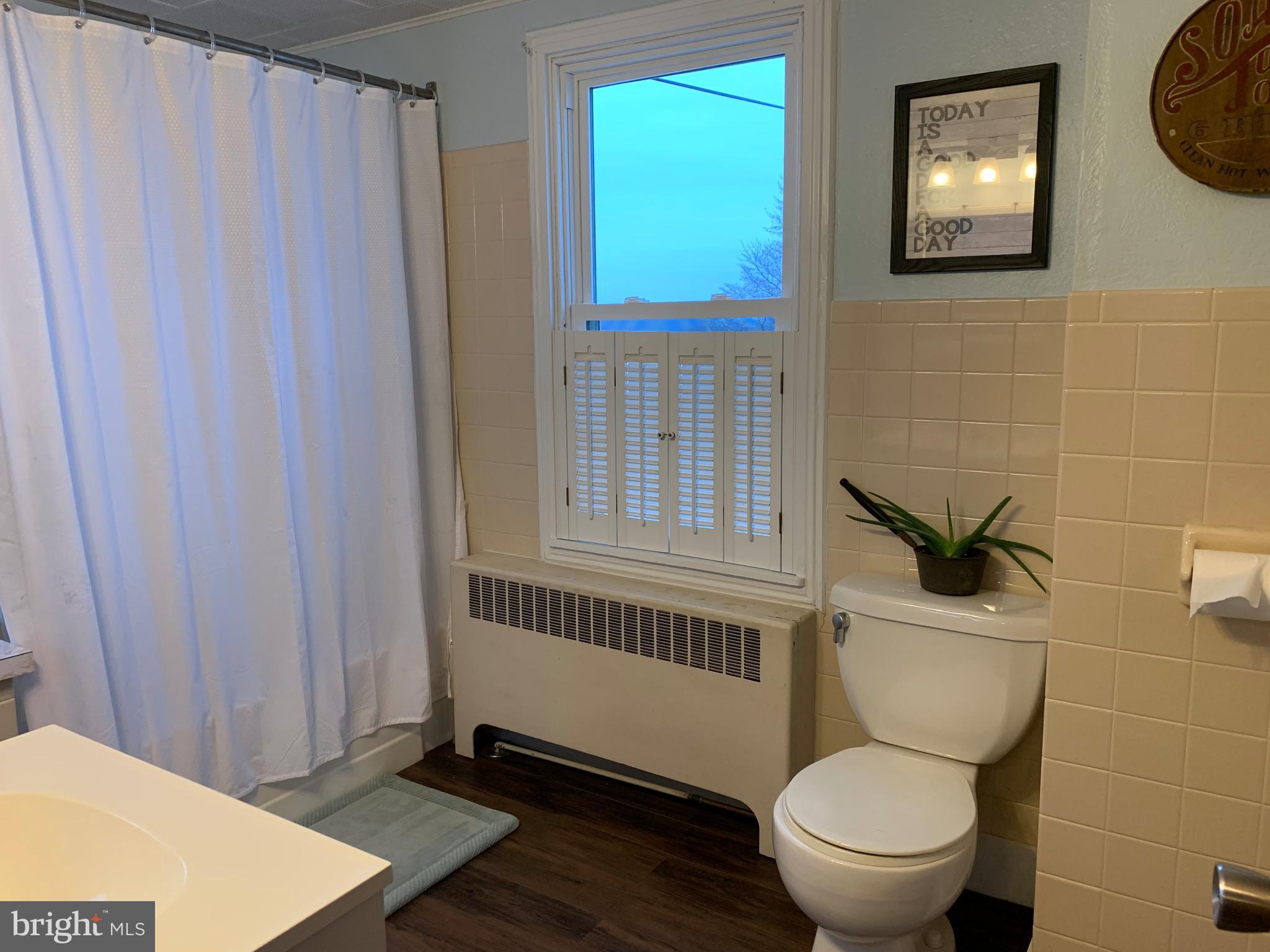 3317 River Road Conestoga, PA 17516 - Photo 15 of 33 a bathroom with a toilet and a sink