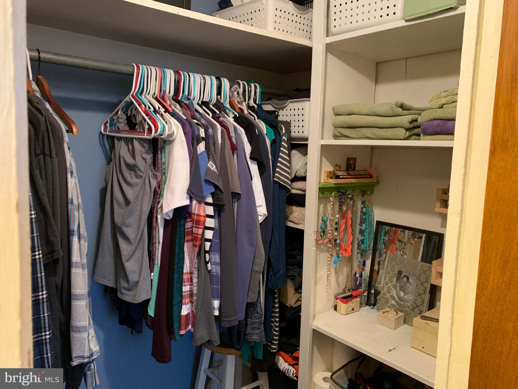 3317 River Road Conestoga, PA 17516 - Photo 17 of 33 a view of walk in closet with clothes and shoes