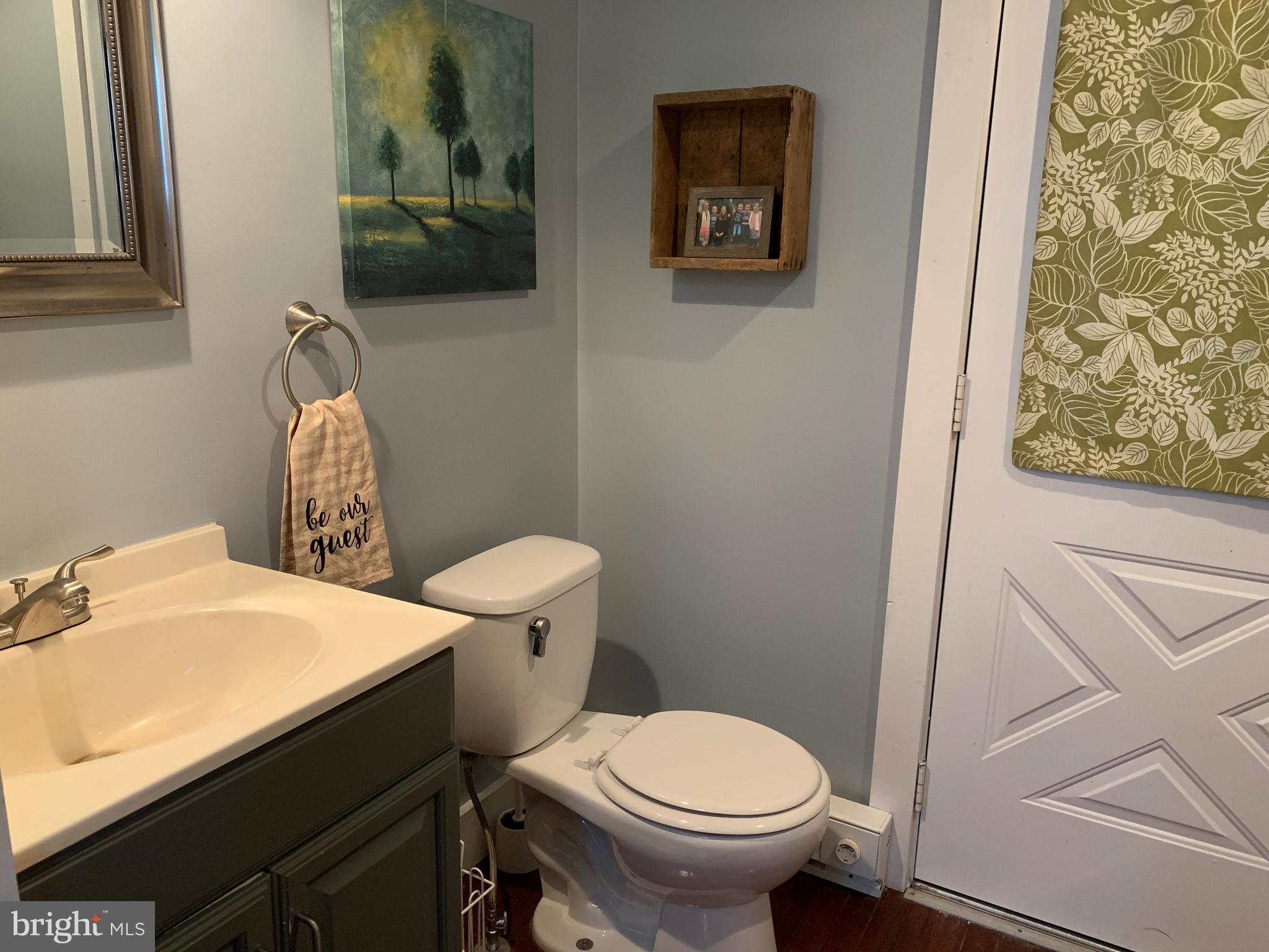 3317 River Road Conestoga, PA 17516 - Photo 20 of 33 a white toilet sitting next to a bathroom sink
