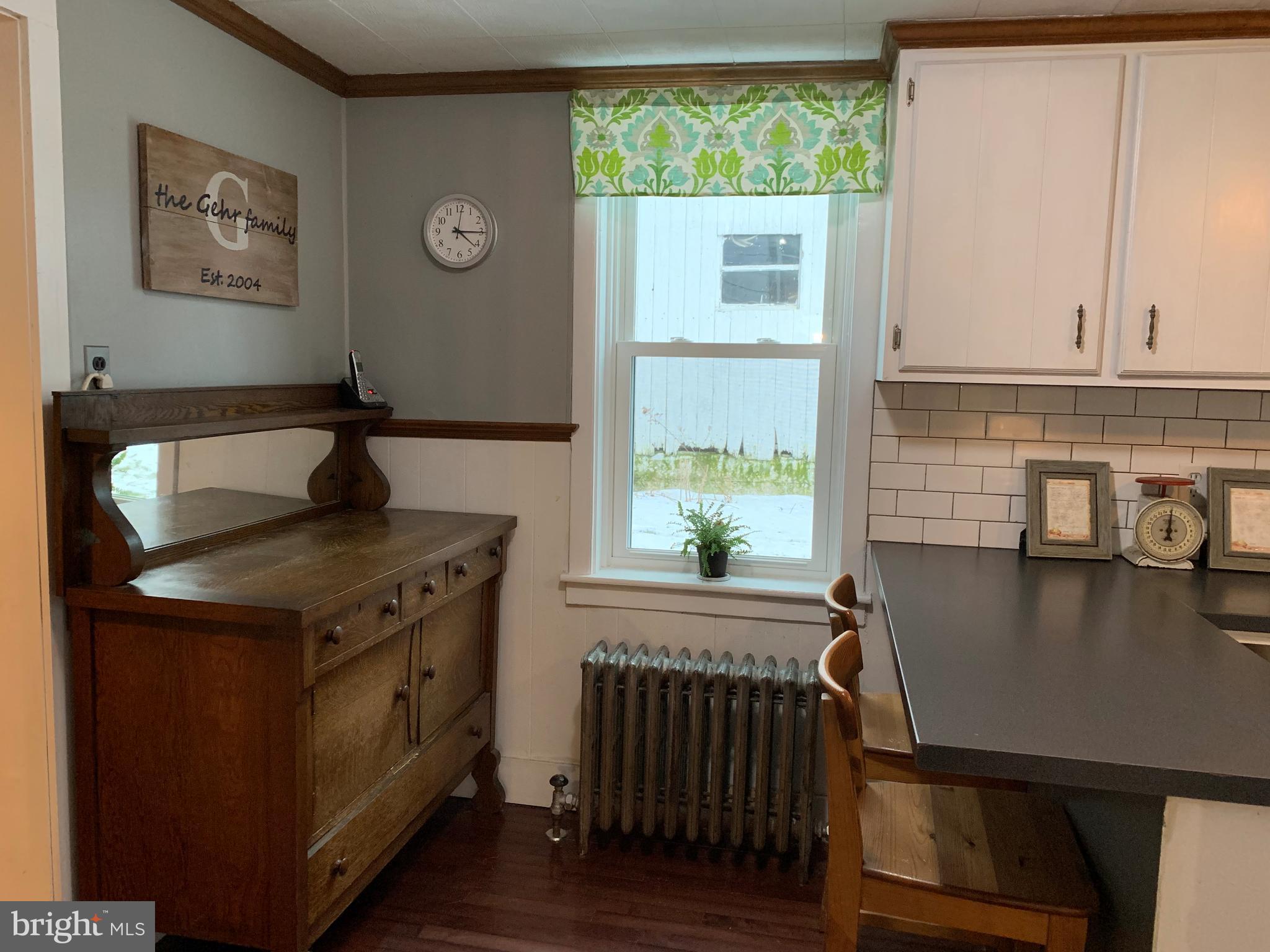 3317 River Road Conestoga, PA 17516 - Photo 6 of 33 a kitchen with a stove a sink and a window
