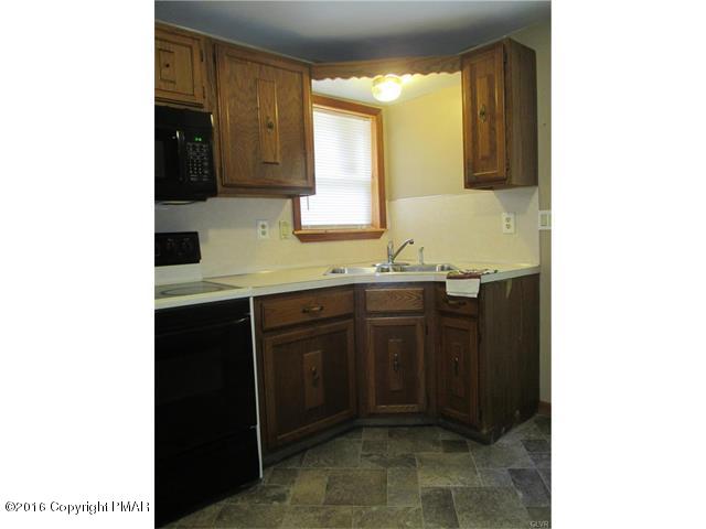 1111 Silver Maple Road Effort, PA 18330 - Photo 11 of 31 a bathroom with a sink and a mirror