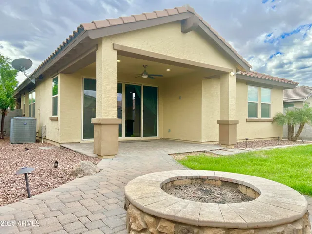 a view of a house with entertaining space