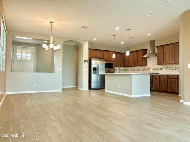 a view of kitchen with cabinets and stainless steel appliances