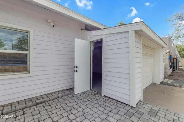 a view of a house with white door