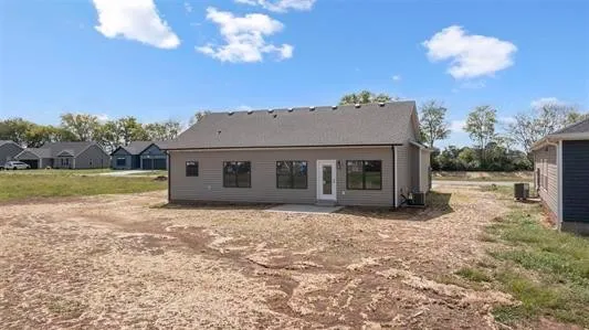 a house view with a garden space