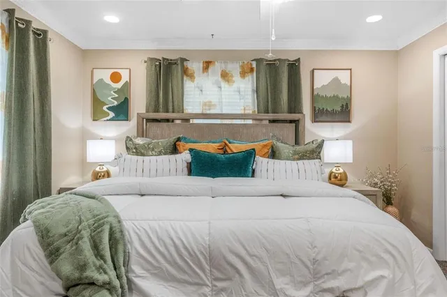 a bedroom with a bed and window