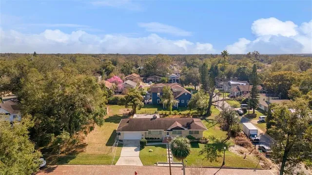 a view of swimming pool and outdoor seating