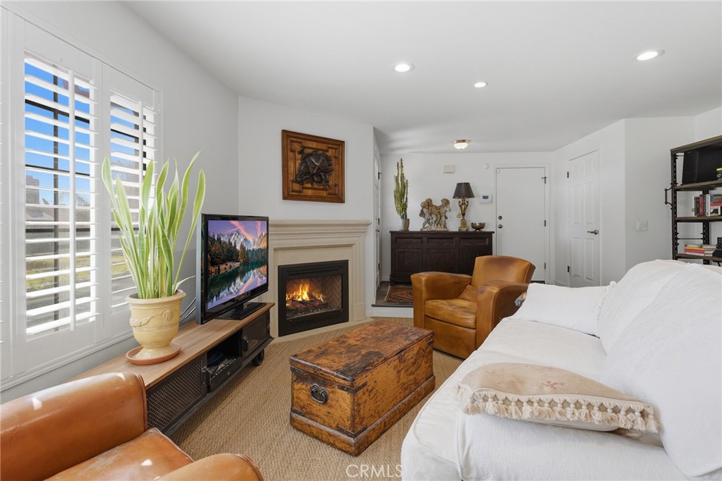 27843 Parker Road Castaic, CA 91384 - Photo 16 of 61 a living room with furniture flat screen tv and a fireplace