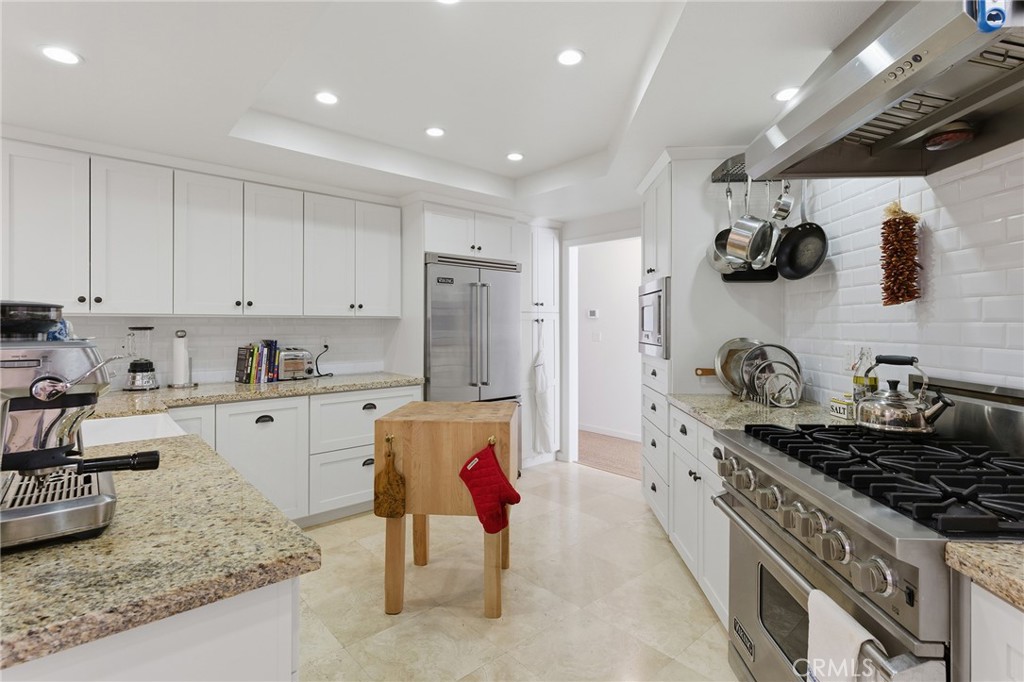 27843 Parker Road Castaic, CA 91384 - Photo 17 of 61 a kitchen with stainless steel appliances granite countertop a sink stove and refrigerator
