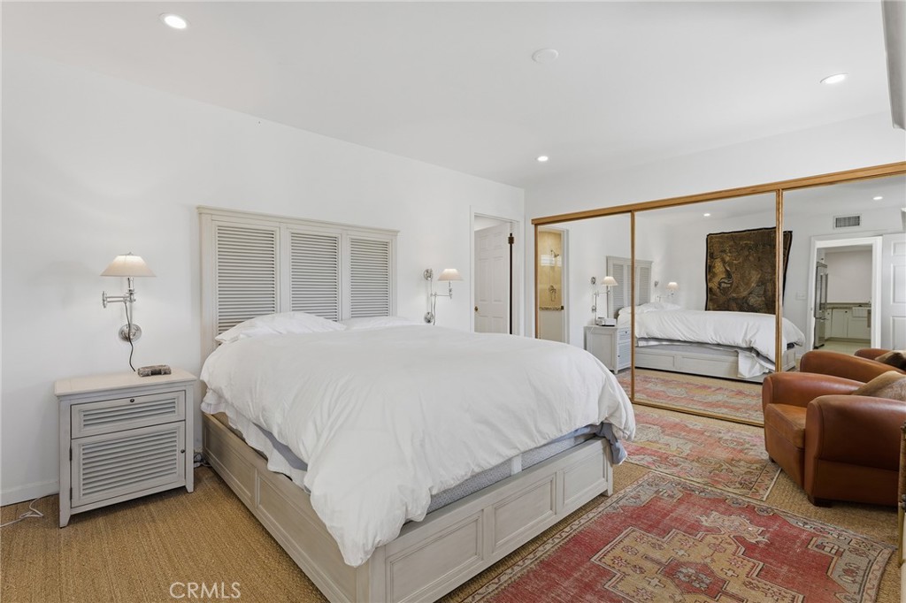 27843 Parker Road Castaic, CA 91384 - Photo 29 of 61 a spacious bedroom with a bed a couch and dresser