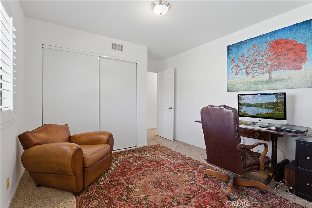 27843 Parker Road Castaic, CA 91384 - Photo 35 of 61 a living room with furniture a couch and a flat screen tv