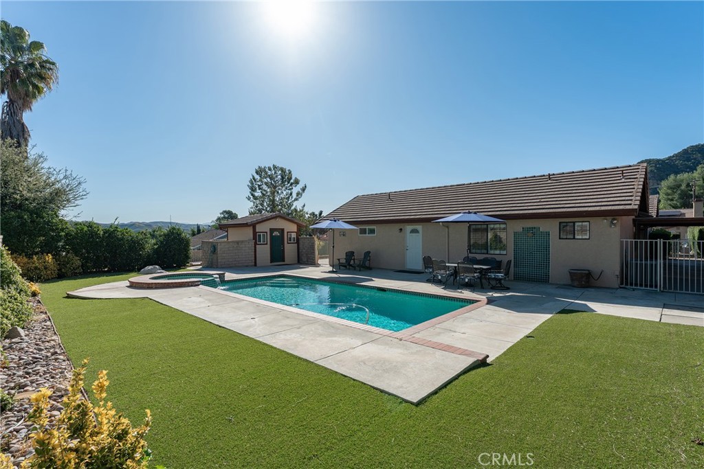 27843 Parker Road Castaic, CA 91384 - Photo 43 of 61 a view of a house with swimming pool and sitting area