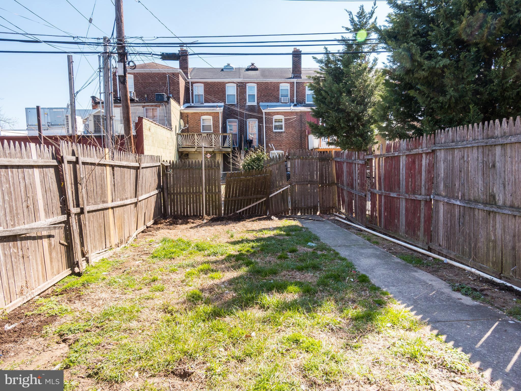 7757 Wynbrook Road Baltimore, MD 21224 - Photo 15 of 30 Rear yard with potential for parking pad.)