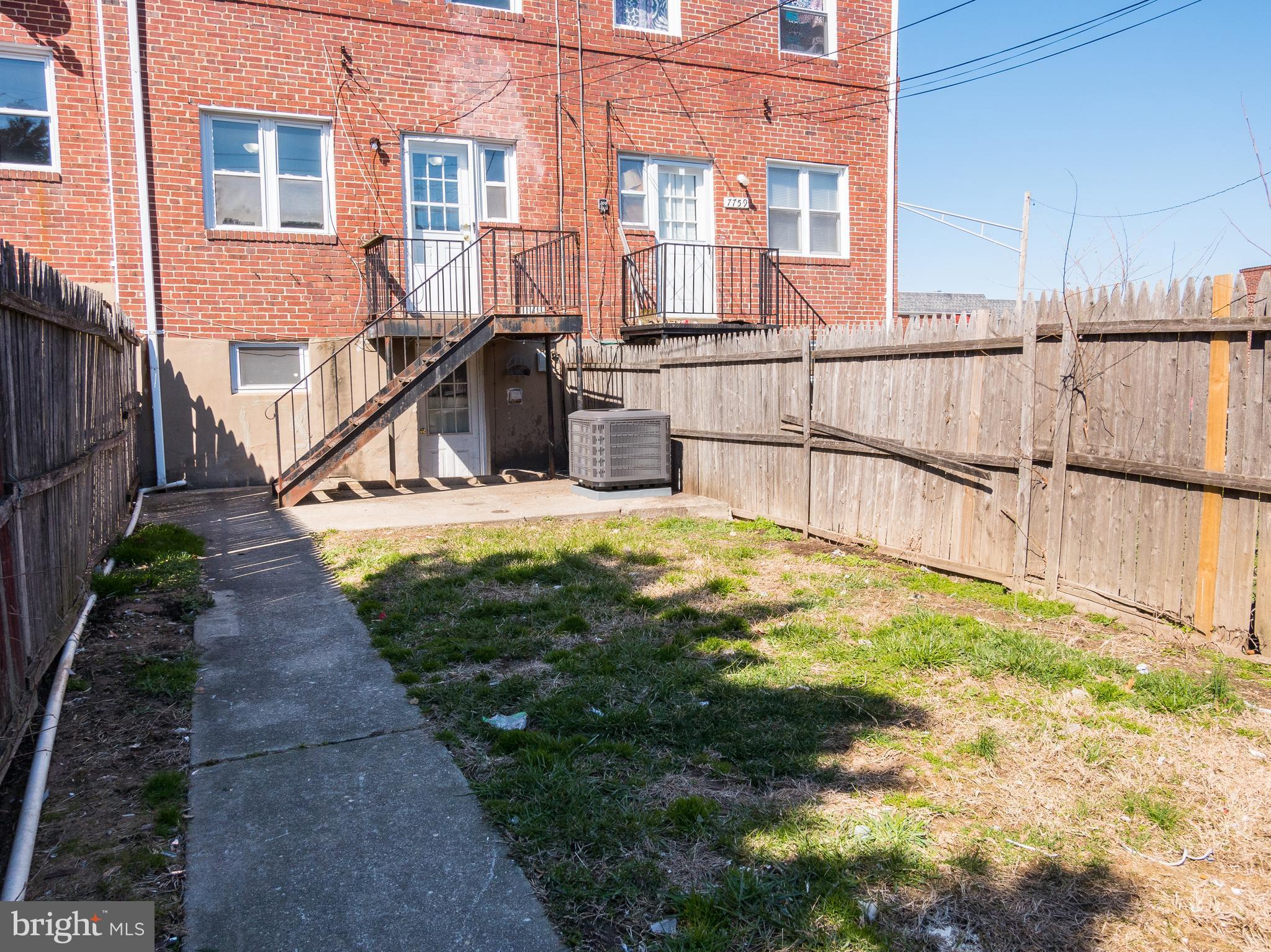 7757 Wynbrook Road Baltimore, MD 21224 - Photo 16 of 30 View of yard looking at back of house.