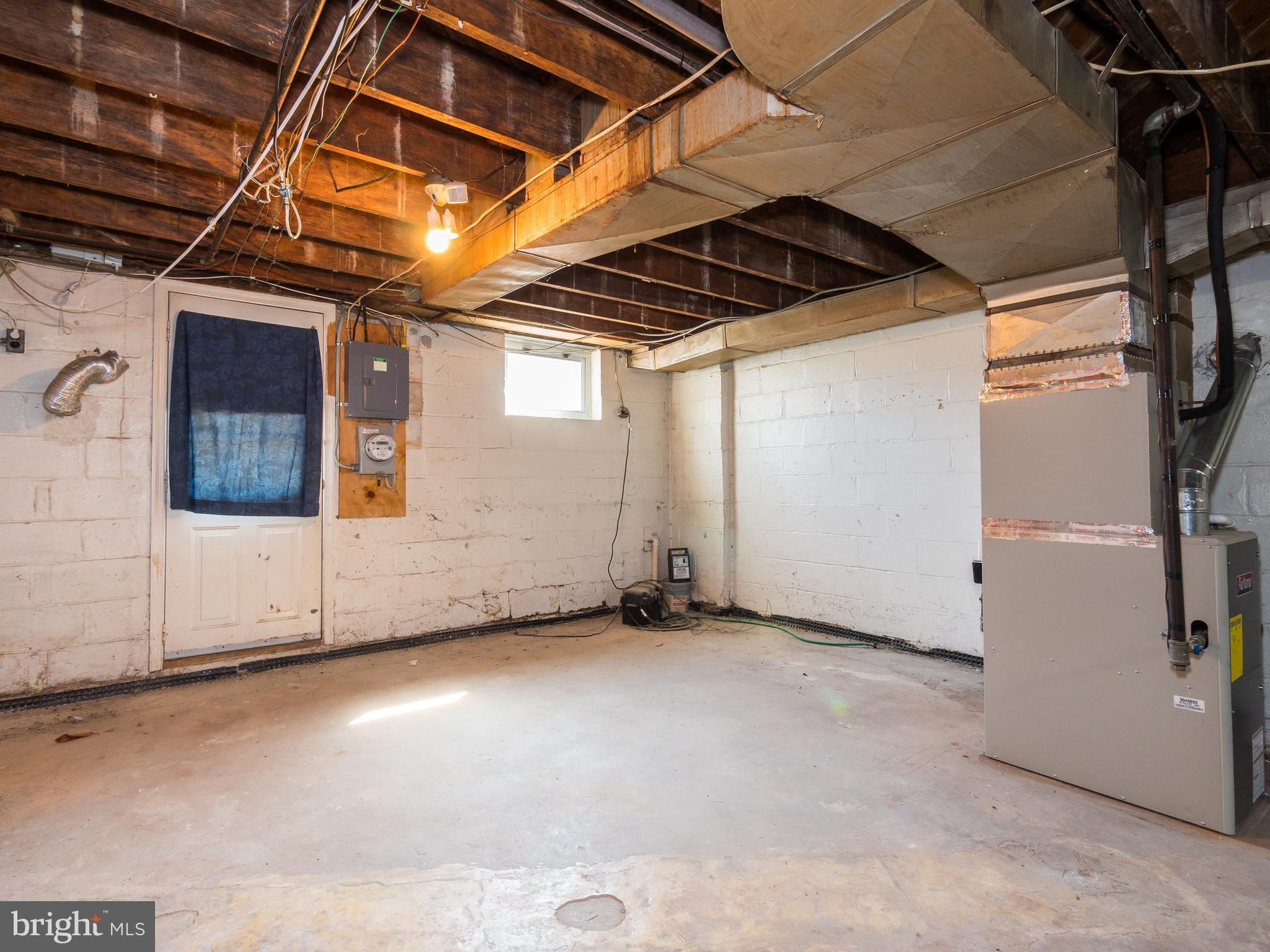 7757 Wynbrook Road Baltimore, MD 21224 - Photo 21 of 30 Basement with new furnace and central air conditio