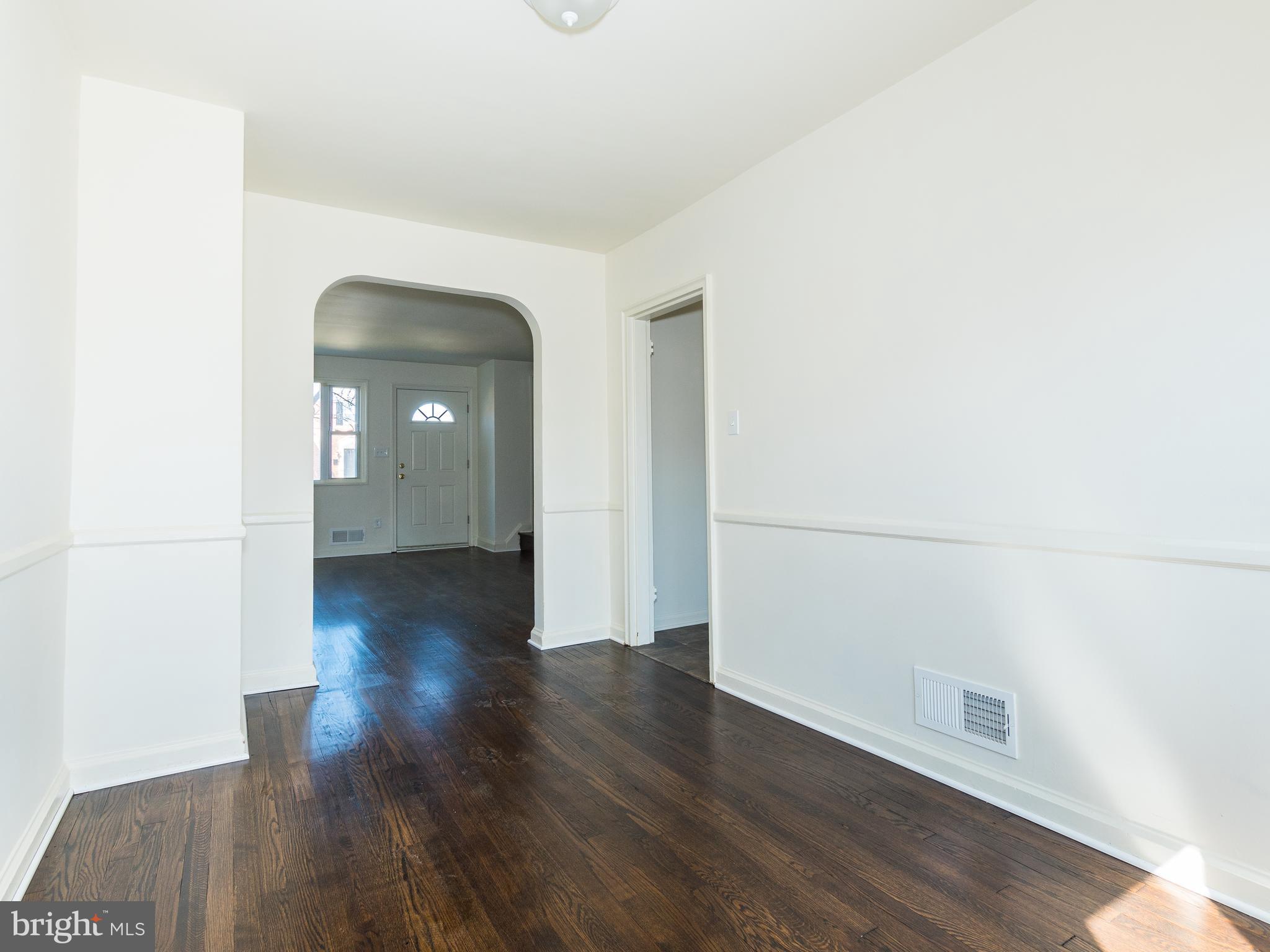 7757 Wynbrook Road Baltimore, MD 21224 - Photo 6 of 30 Dining Room looking to living room
