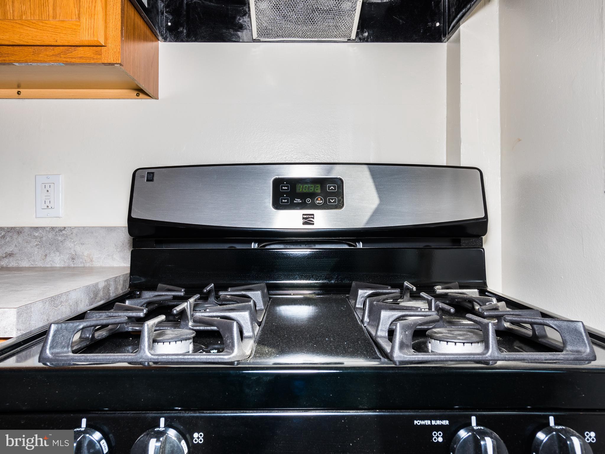 7757 Wynbrook Road Baltimore, MD 21224 - Photo 10 of 30 New gas range/oven and overhead fan