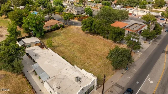 an aerial view of residential house with outdoor space