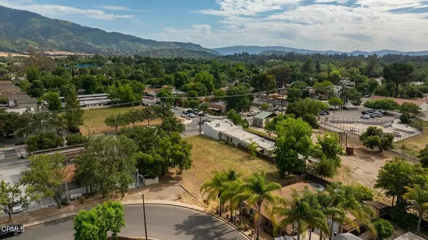a view of a city with mountains in the background