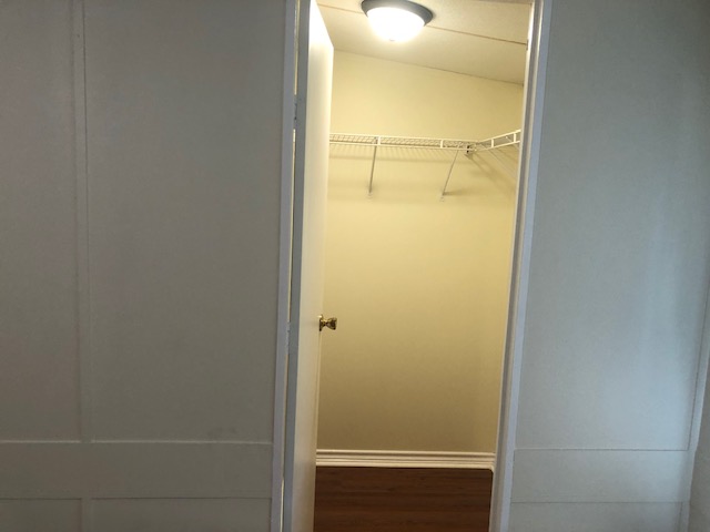 302 North Burnet Street Bremond, TX 76629 - Photo 24 of 41 a bathroom with a glass shower door