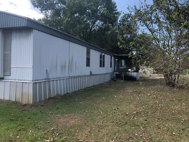 302 North Burnet Street Bremond, TX 76629 - Photo 35 of 41 a view of backyard with deck