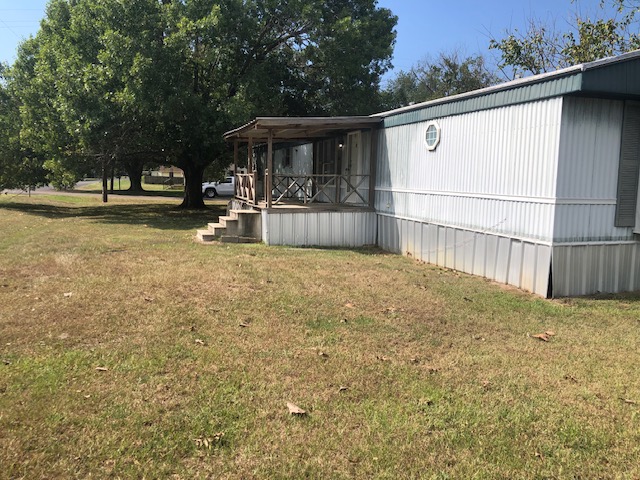 302 North Burnet Street Bremond, TX 76629 - Photo 36 of 41 a view of a backyard