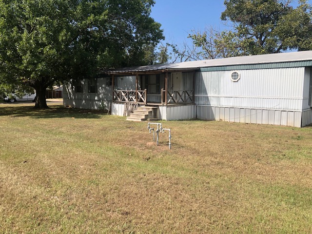 302 North Burnet Street Bremond, TX 76629 - Photo 38 of 41 a view of a house with a outdoor space