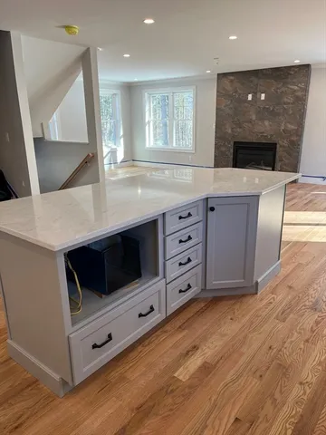 a kitchen with stainless steel appliances a stove a sink and a refrigerator