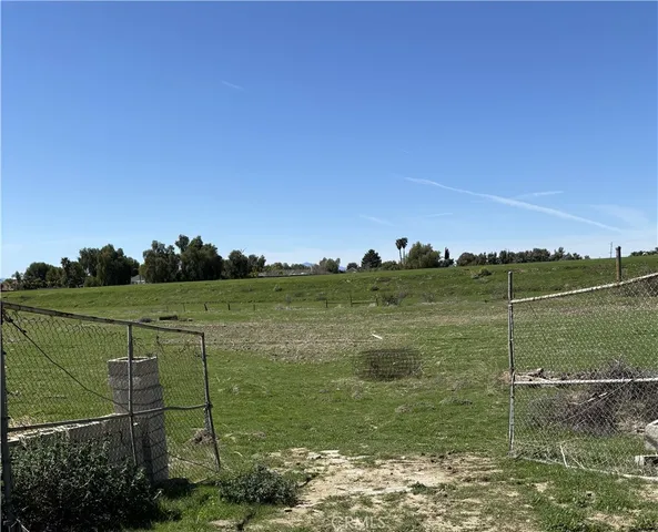 a view of a lake in middle of forest