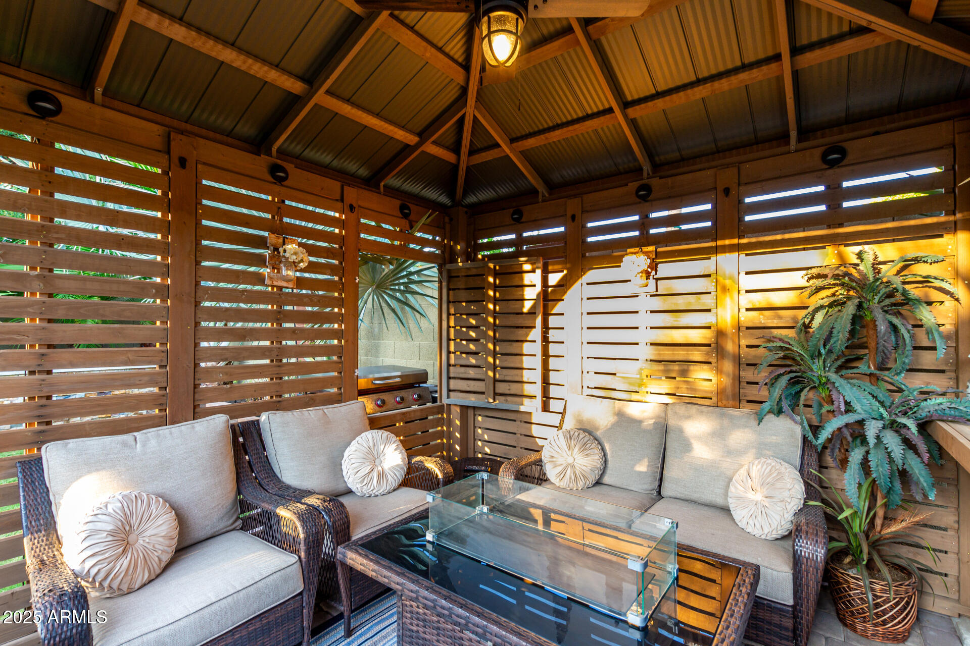 5956 East Phelps Road Scottsdale, AZ 85254 - Photo 2 of 60 a living room with furniture and a floor to ceiling window