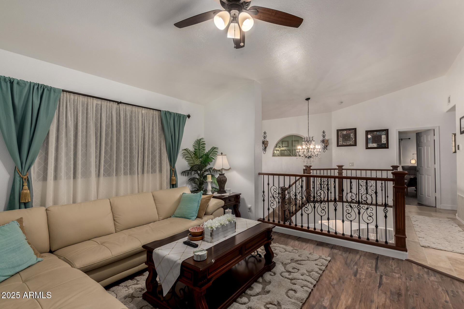 5956 East Phelps Road Scottsdale, AZ 85254 - Photo 37 of 60 a living room with furniture and wooden floor