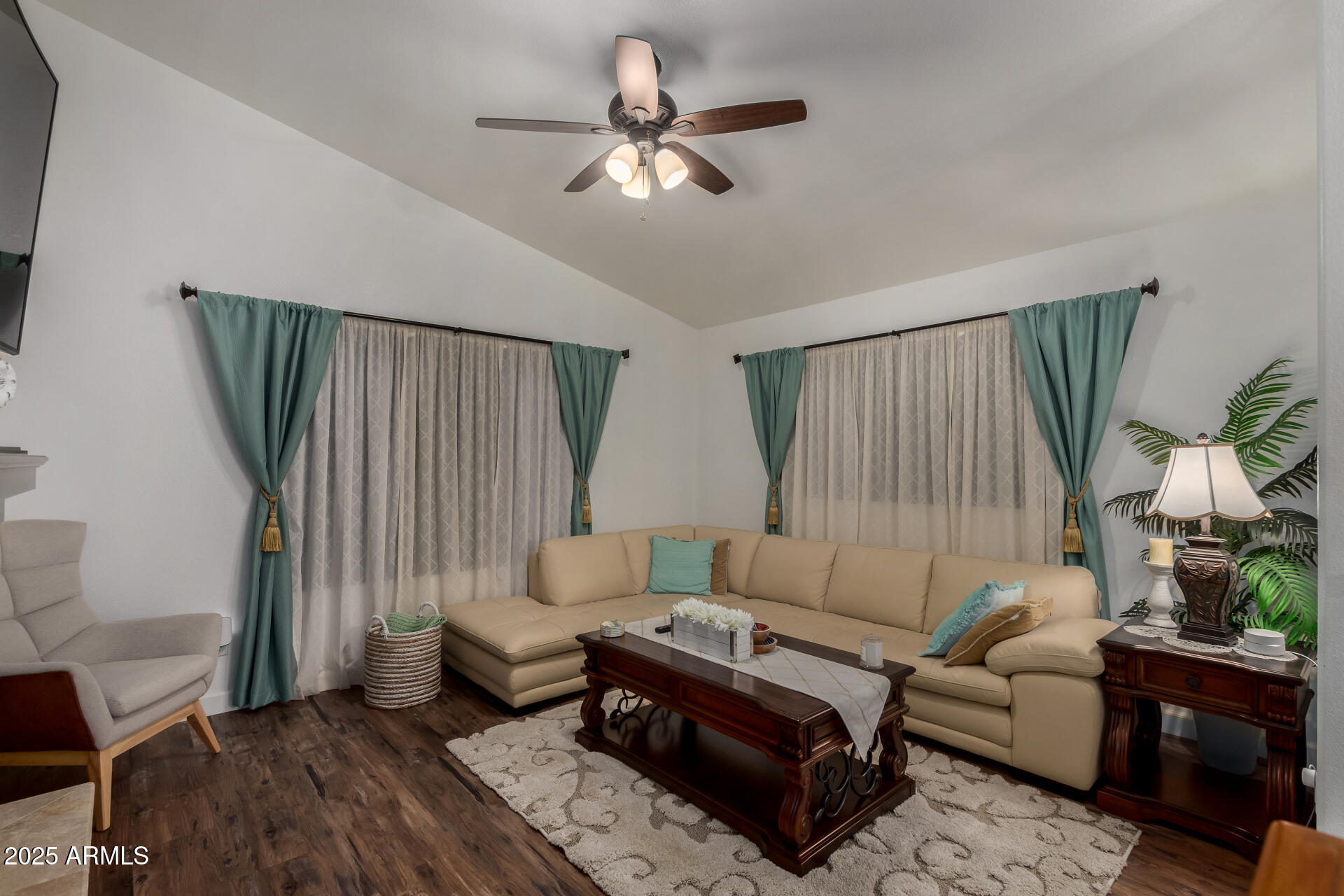 5956 East Phelps Road Scottsdale, AZ 85254 - Photo 40 of 60 a living room with furniture and a large window