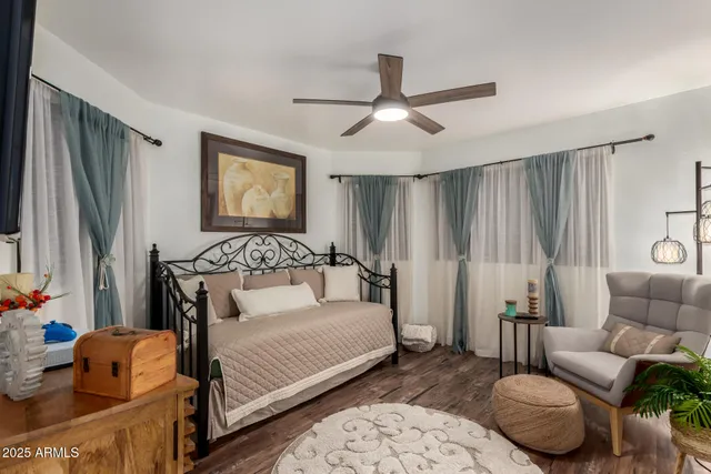 a view of an outdoor sitting area with brick walls